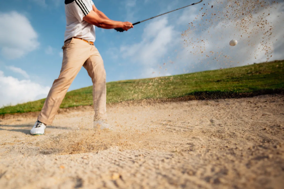 
Man in Golf Bunker.jpg