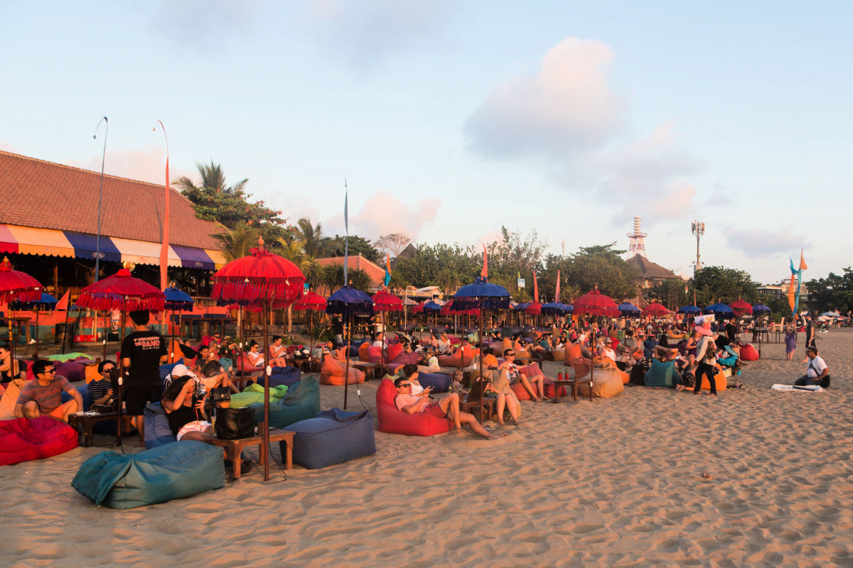 Tourists on Seminyak Beach in Bali.jpg