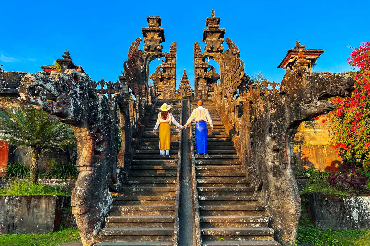 Couple Stand on Temple Steps in BAli.jpg