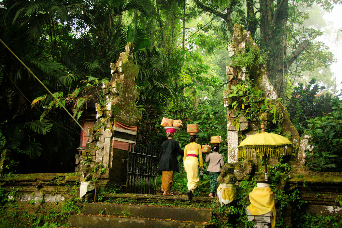 Balinese Hindus Enter Temple in Bali