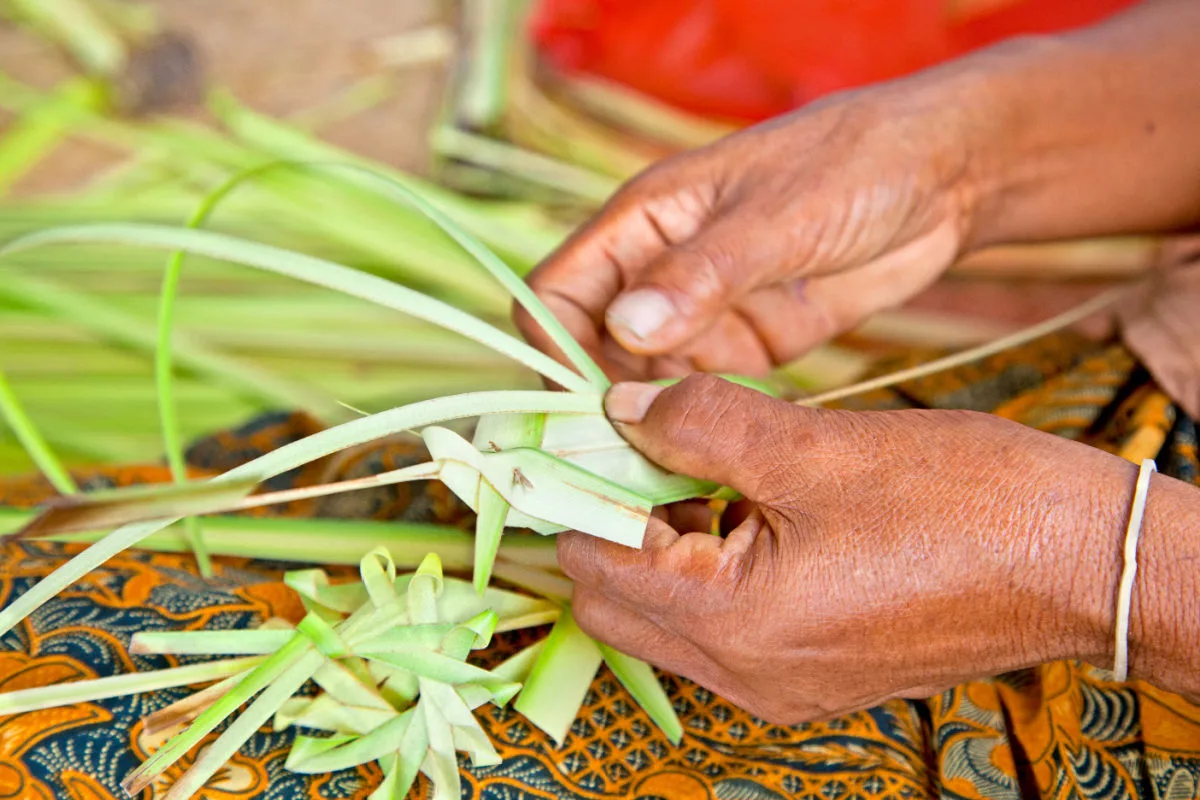 Woman Makes Canang Sari in Bali.jpg