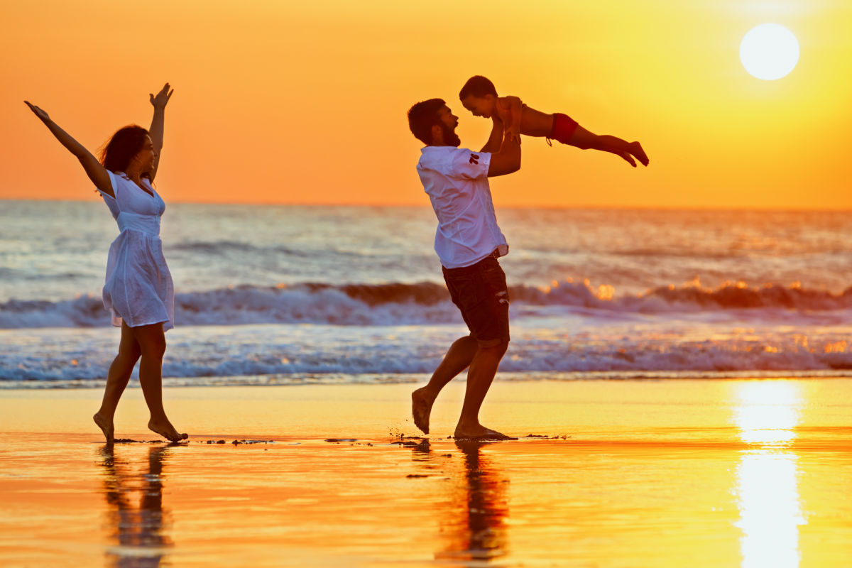 Family on beach at sunset.jpg