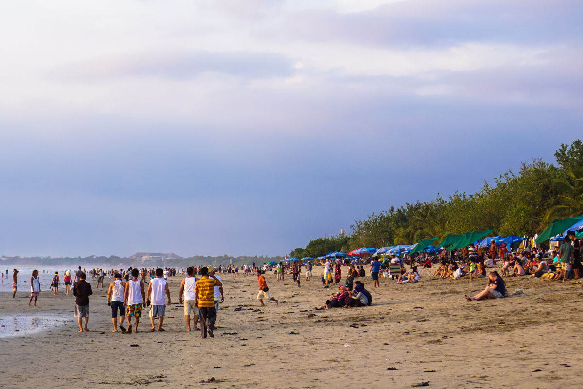 Tourists on Kuta Beach in Bali.jpg