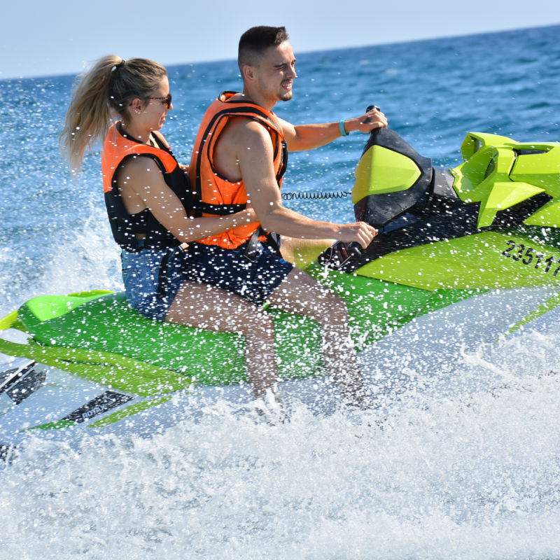 Couple-on-a-jetski-on-ocean