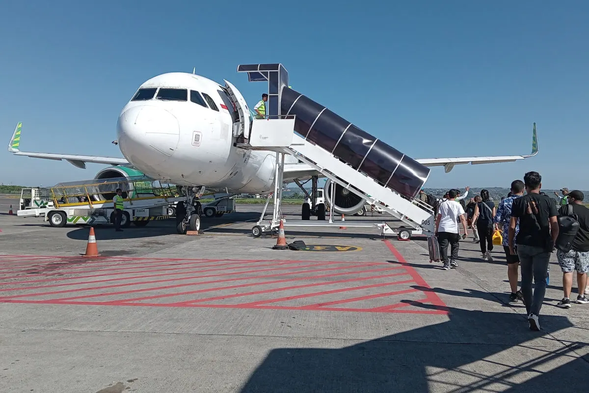 Passengers Board Plane in Bali.jpg