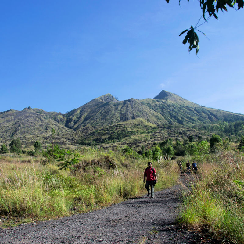 Man-Walks-Down-Mount-Btur-Kintamani-Path