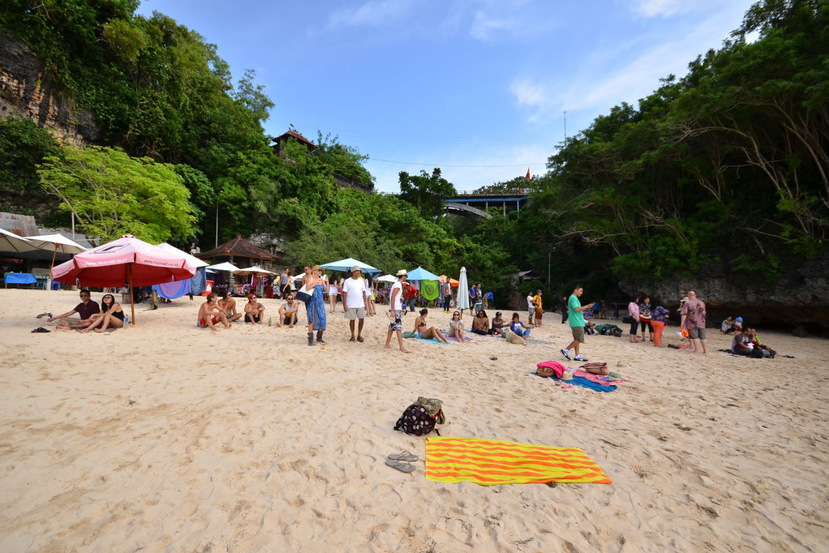 Tourists on a Busy Padang Padang Beach in Uluwatu Bali.jpg