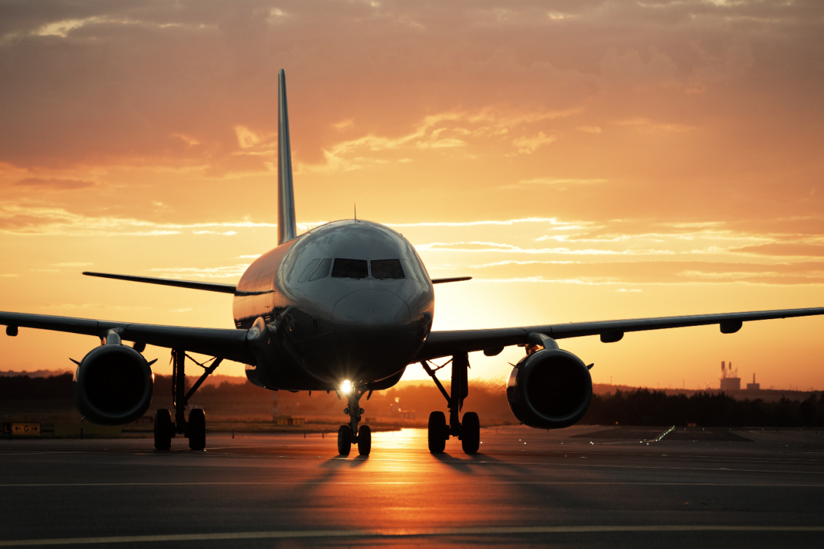 Plane on Runway at Sunset.jpg