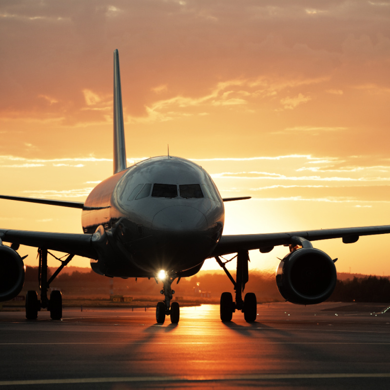 Plane on Runway at Sunset.jpg