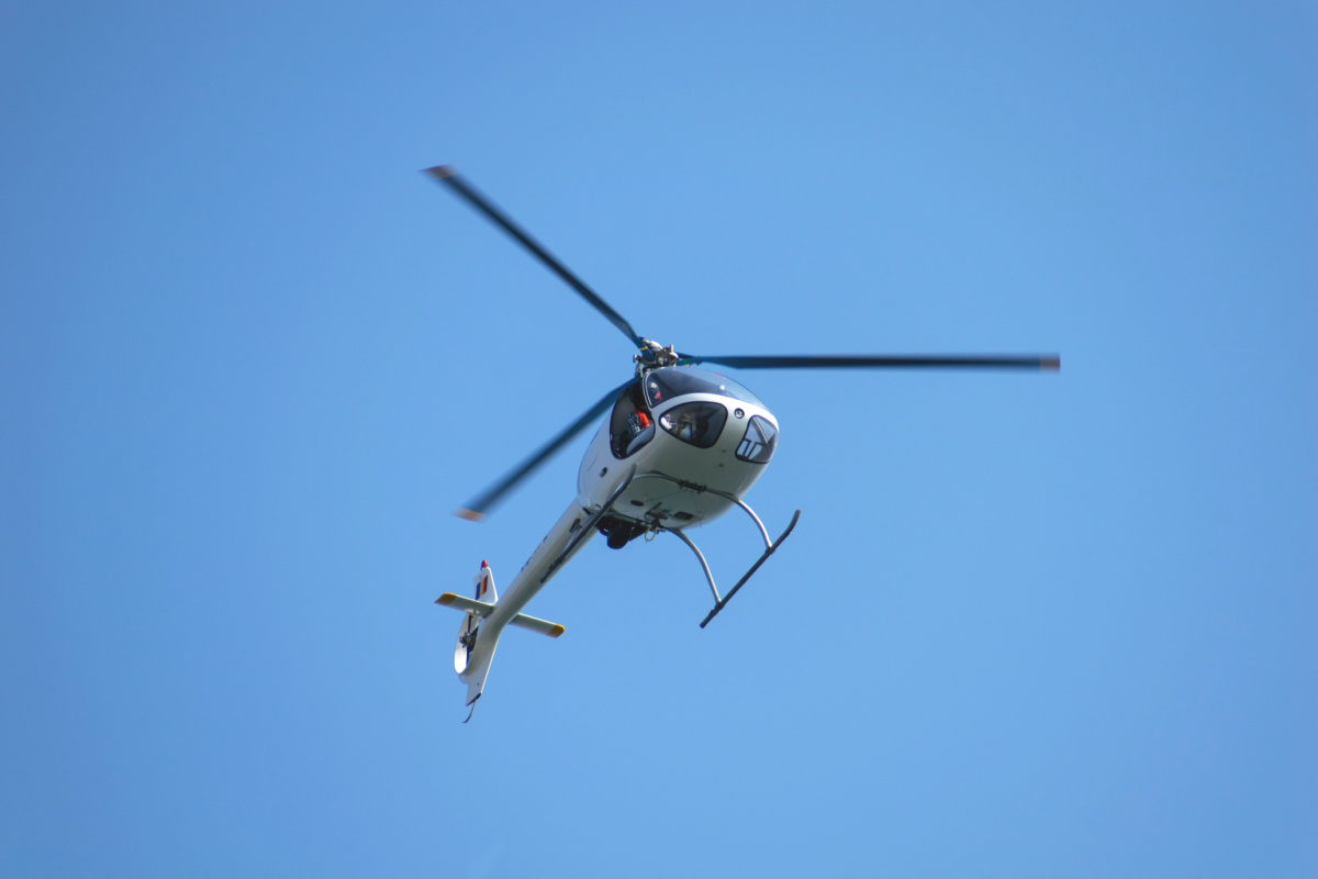 White Helicopter Against Blue Sky.jpg