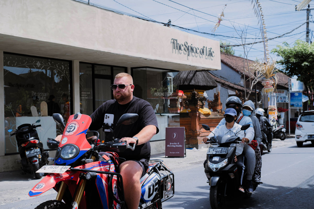 Tourist Drived Moped Without Helmet in Bali.jpg