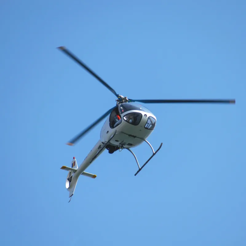 White-Helicopter-Against-Blue-Sky