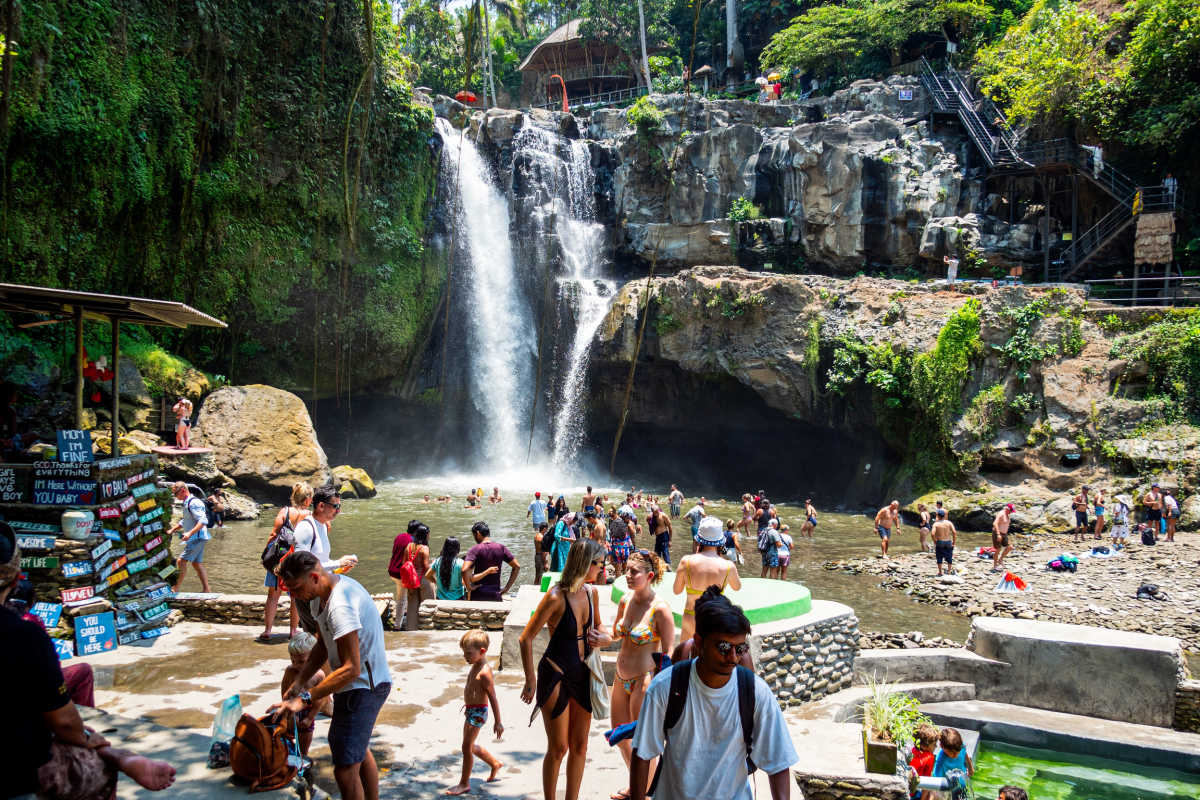 Tourists Crowd At Bali Waterfall.jpg