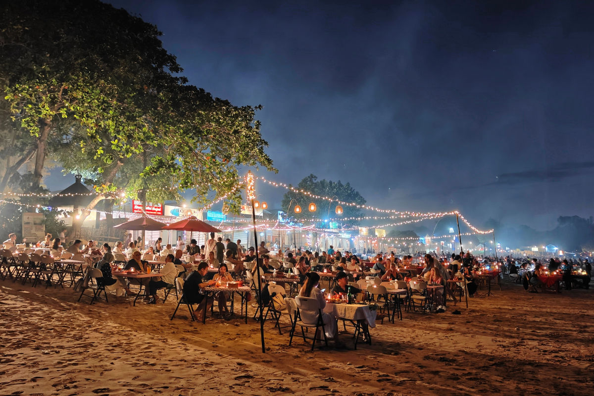 Tourists At Seafood Resturants At Jimbaran Beach.jpg