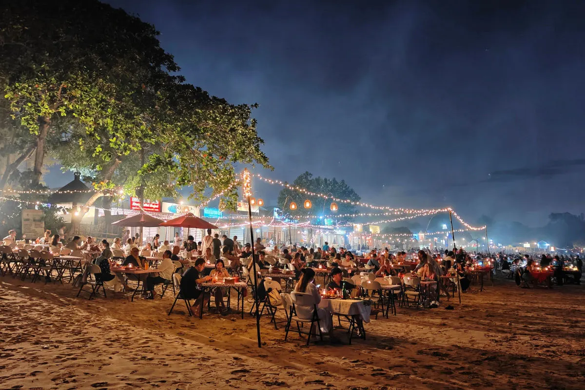 Tourists At Seafood Resturants At Jimbaran Beach.jpg