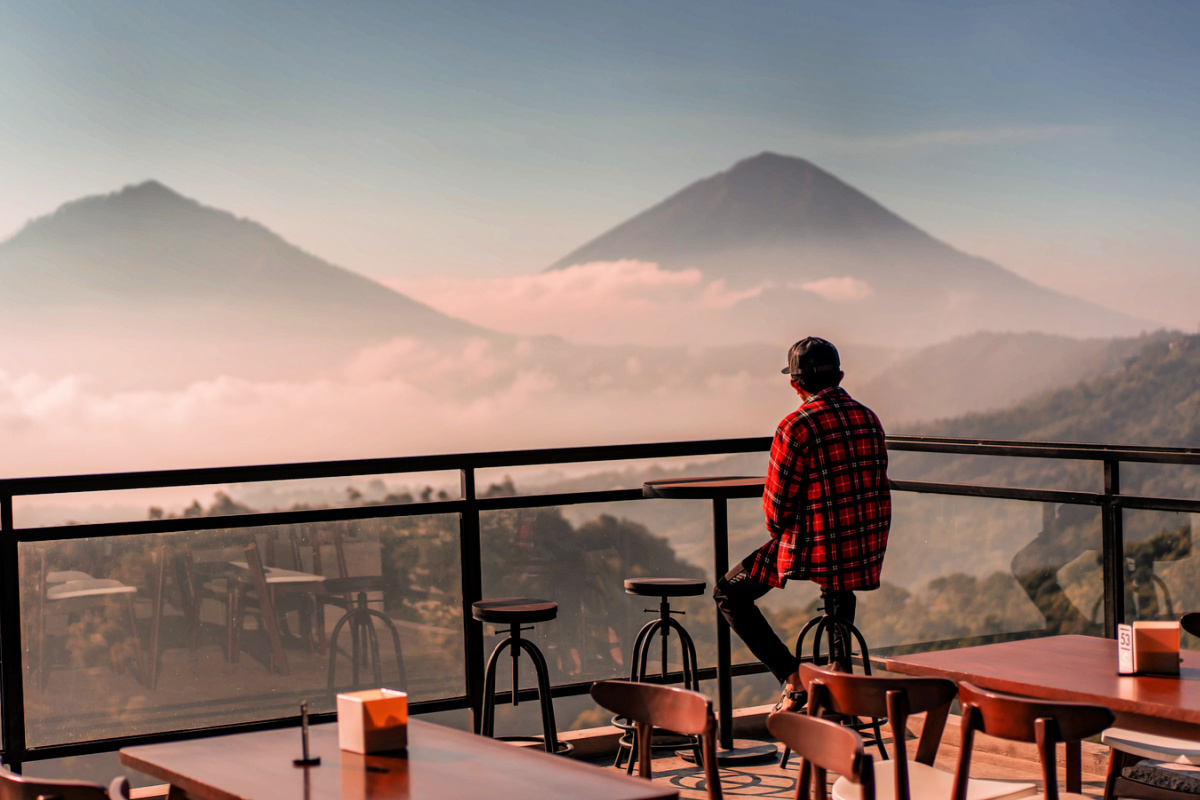 Tourists Sits At Bar At Coffee Cafe In Kintamani Bali.jpg