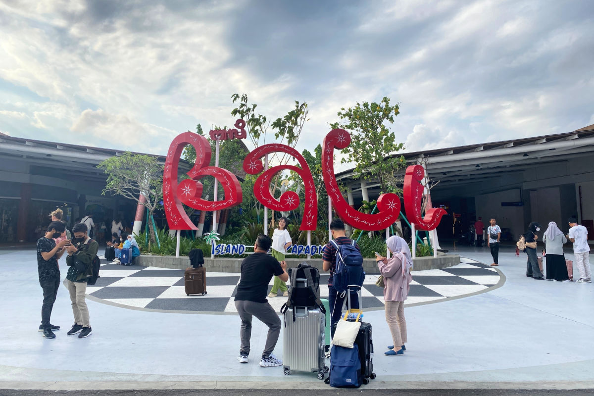 Bali Airport Sign Tourists Take Photos.jpg