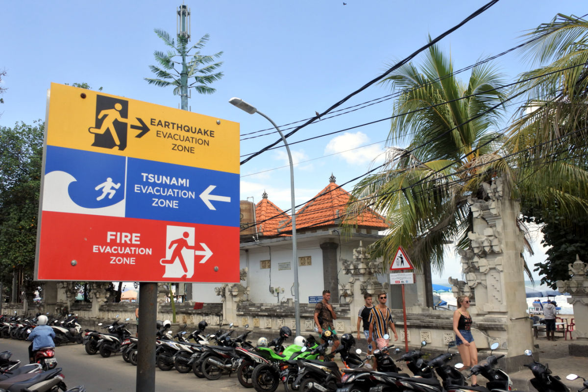 Tsunami and Earthwork Sign By Bali beach