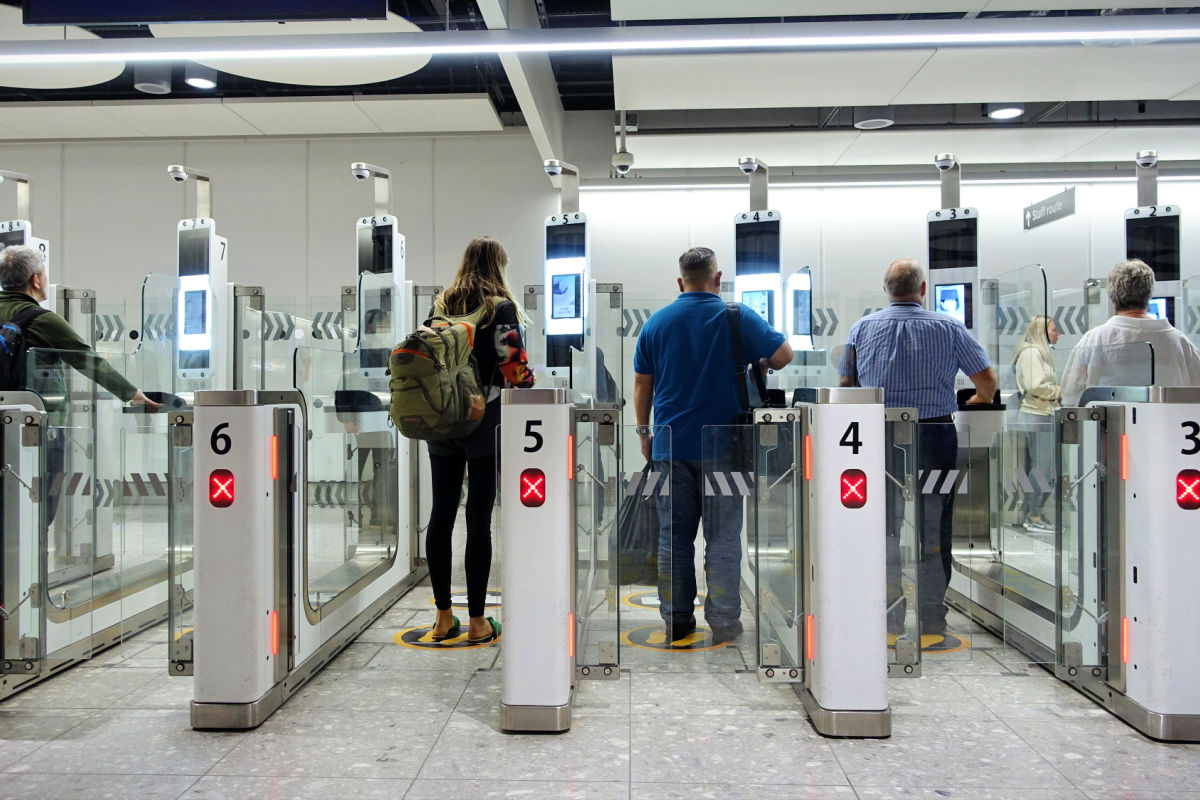 Tourists Use Autogates At Airport.jpg