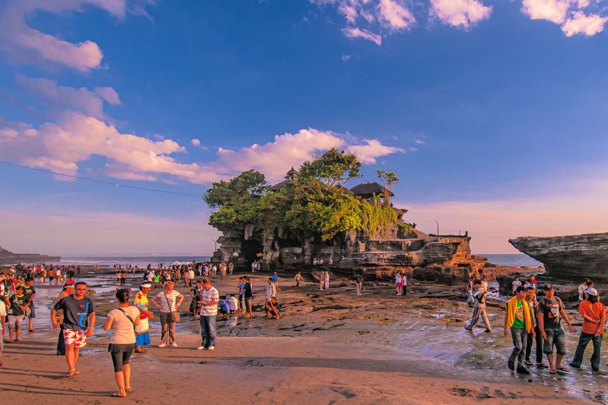 Tourists Explore Tanah Lot Temple in Bali.jpg