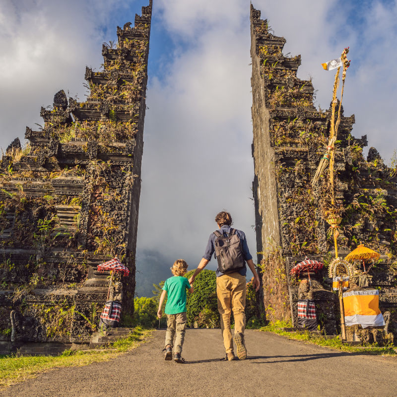 Father and Son Stand by Handara Gate in Bali.jpg