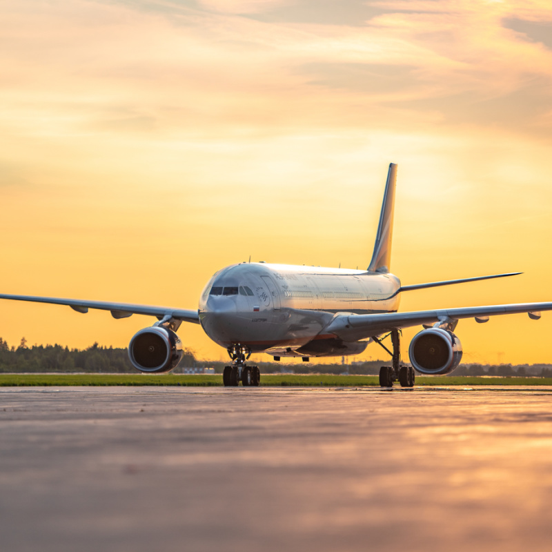 Plane-on-Runway-at-Sunest