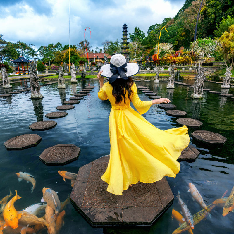 Woman-At-Tirta-Gangga-Water-Palace-in-Bali