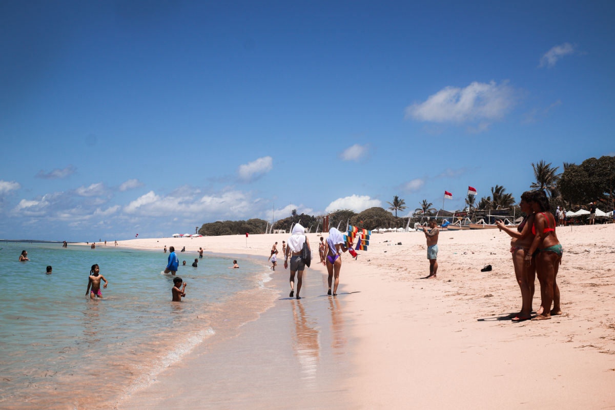 Tourists on Nusa Dua Beach Bali.jpg