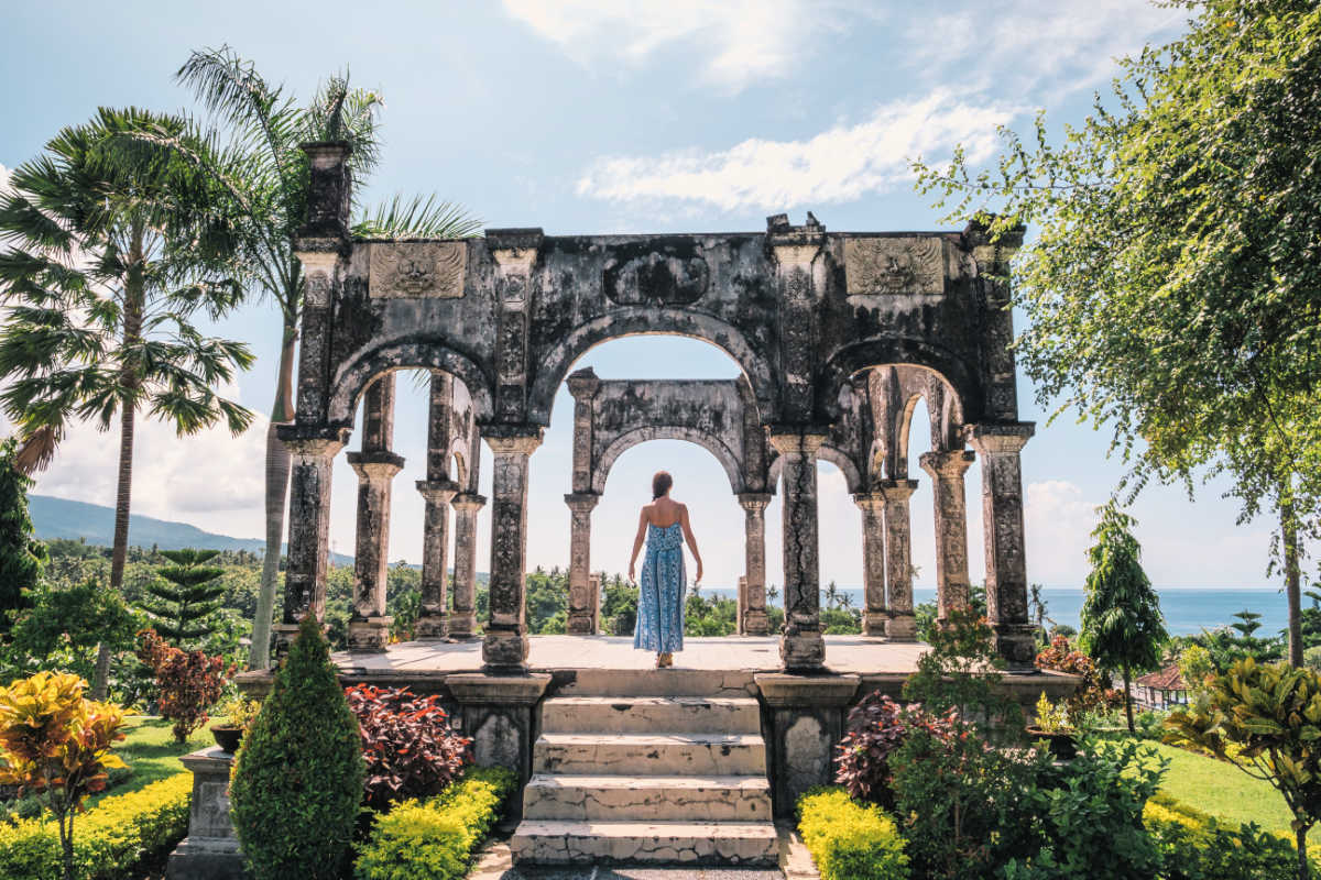 Taman Ujung Palace Woman Stands Bali