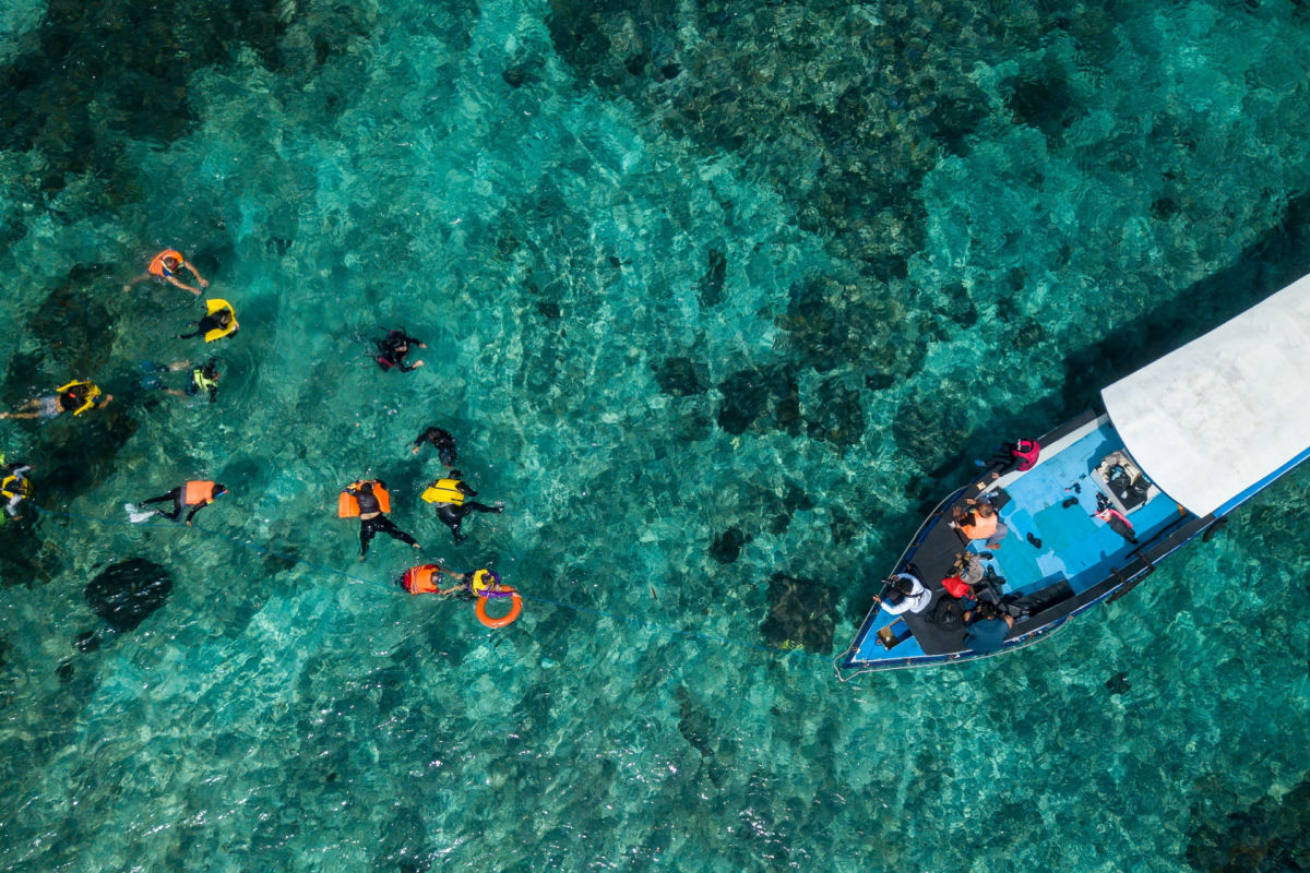 Snorkeling Tourists In Nusa Penida by Boat.jpg