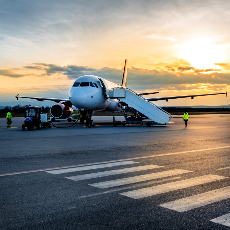 Plane on Runway At Sunset.jpg