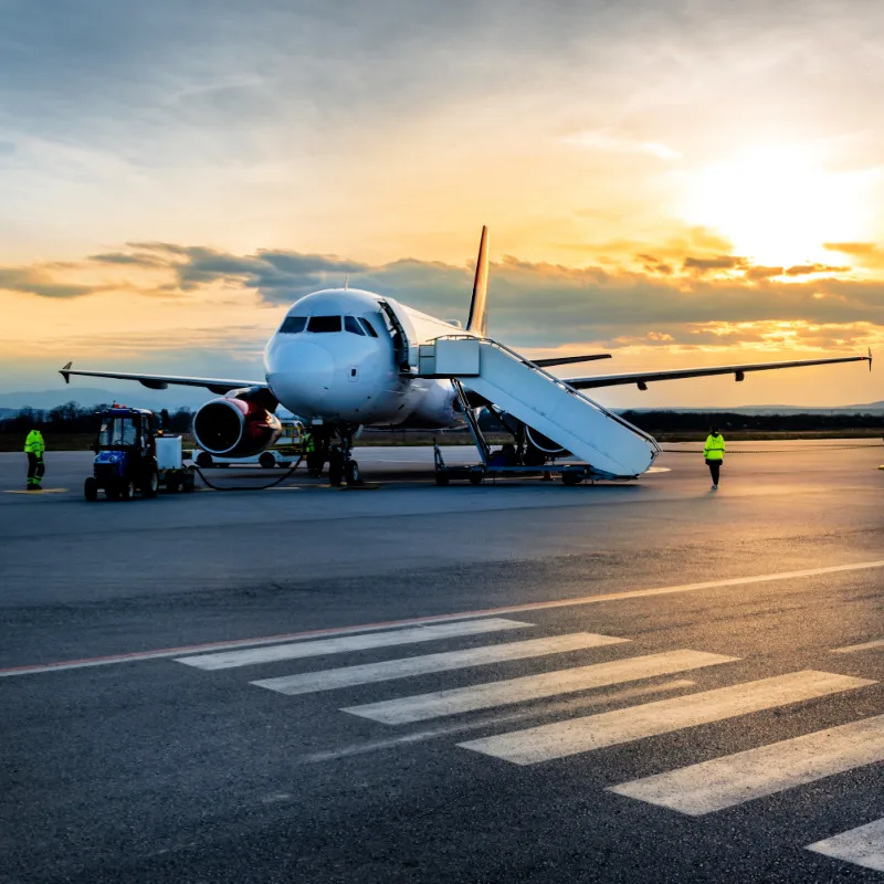 Plane on Runway At Sunset.jpg