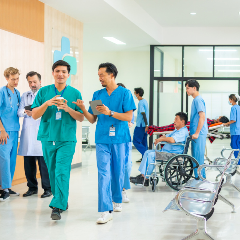 Doctors-In-Modern-Hospital-Reception-Area