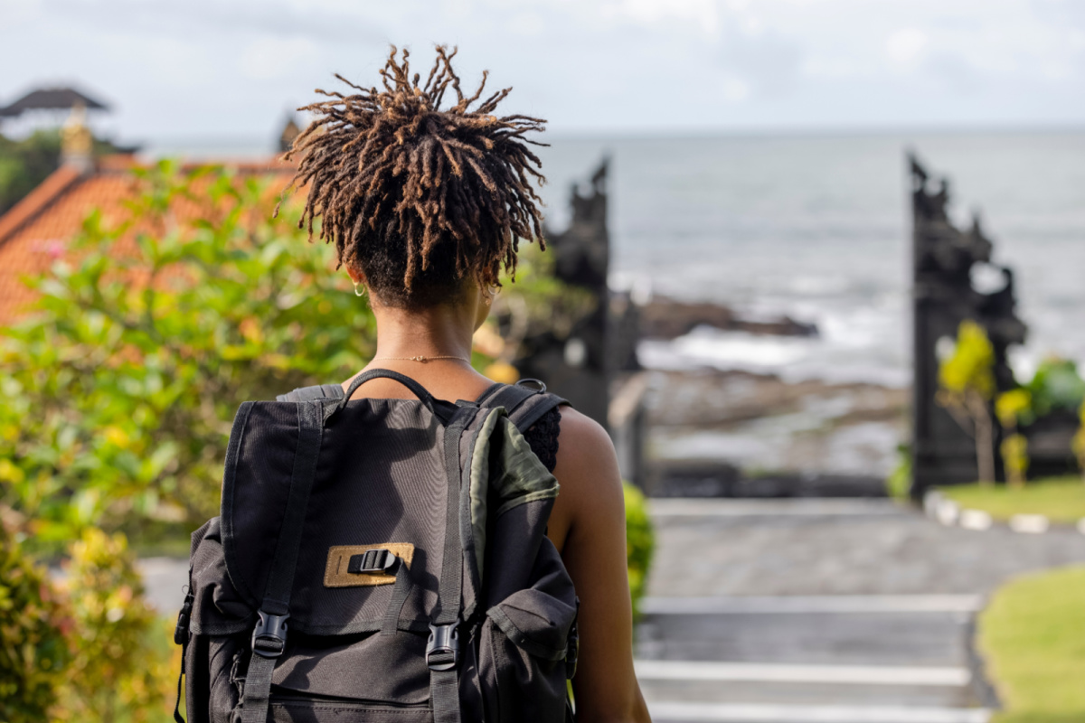 Woman Backpackers Overlooks Bali Beach.jpg