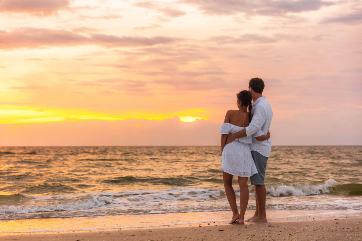 Couple Stand on Bali Beach At Sunset.jpg