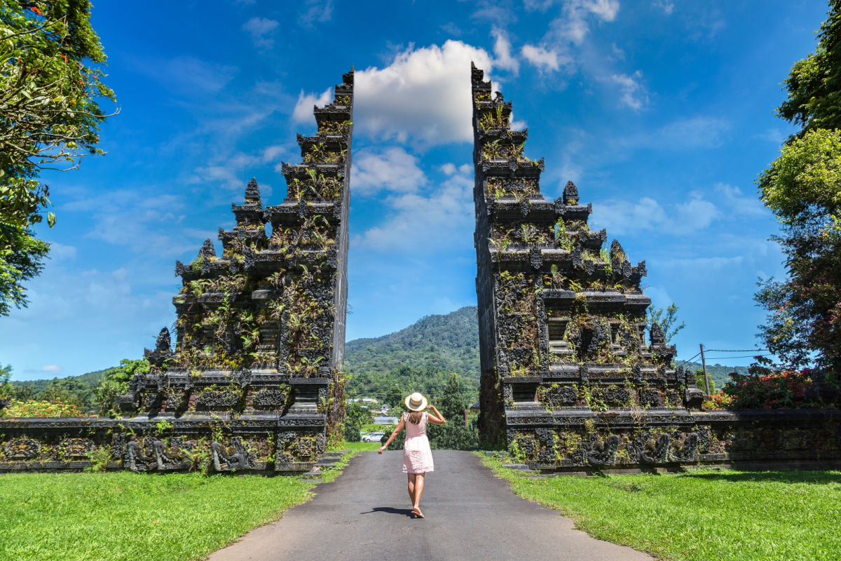 Woman Stands By Bali Handara Gate.jpg