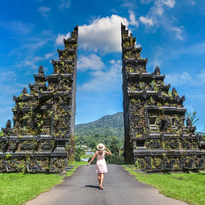 Woman Stands By Bali Handara Gate.jpg