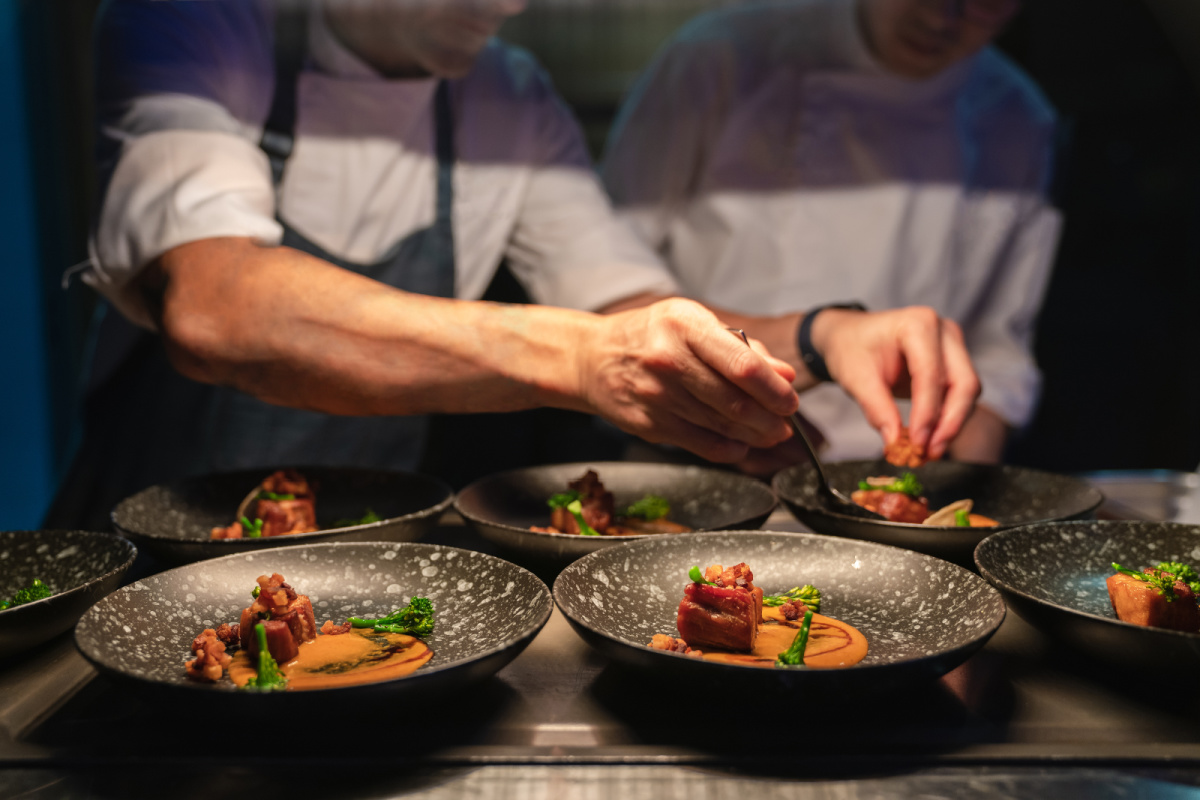 Chefs Plate Up Food In Kitchen Dining .jpg