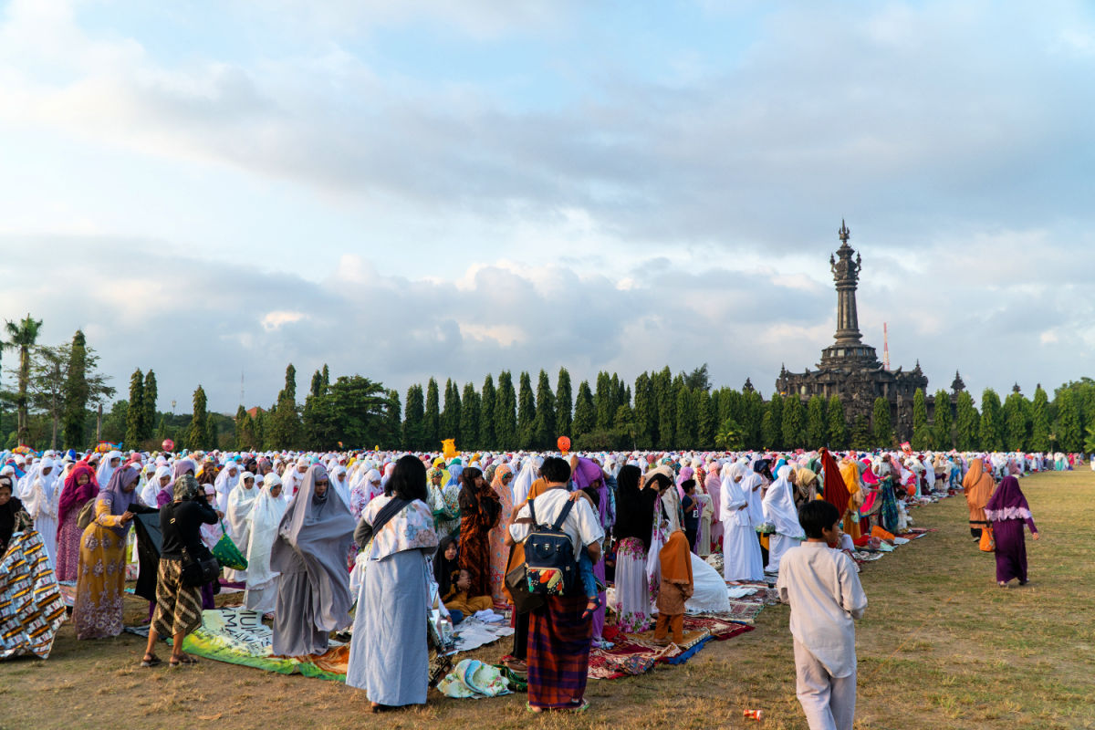 Muslimes Pray at Lumintang Field in Denpasar Bali