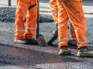 Two Workmen on Road Construction