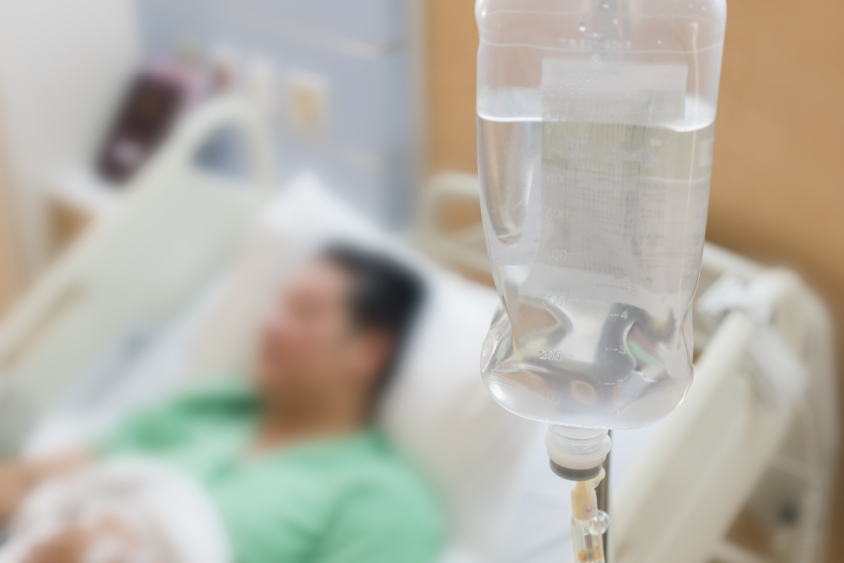 Man in Hospital With IV Drip.jpg