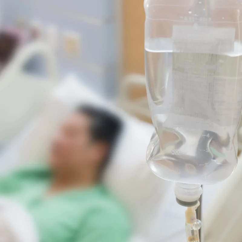 Man in Hospital With IV Drip