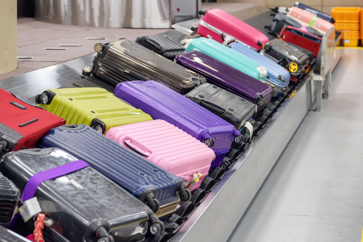 Luggage On Baggae Carousel In Bali Airport.jpg