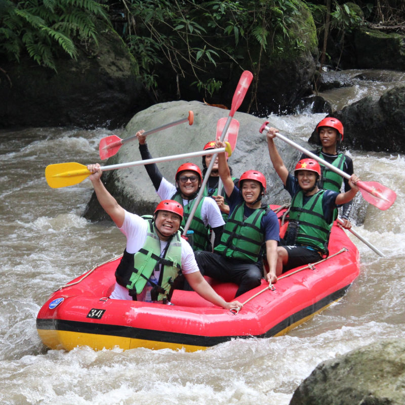Tourists Rafting on River in Bali