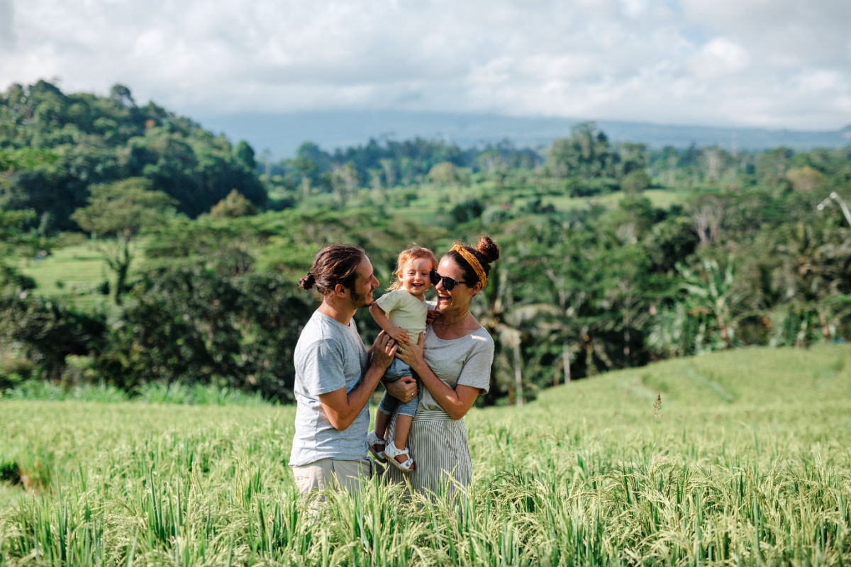 Tourist Family in Bali Enjoy Rice Paddy