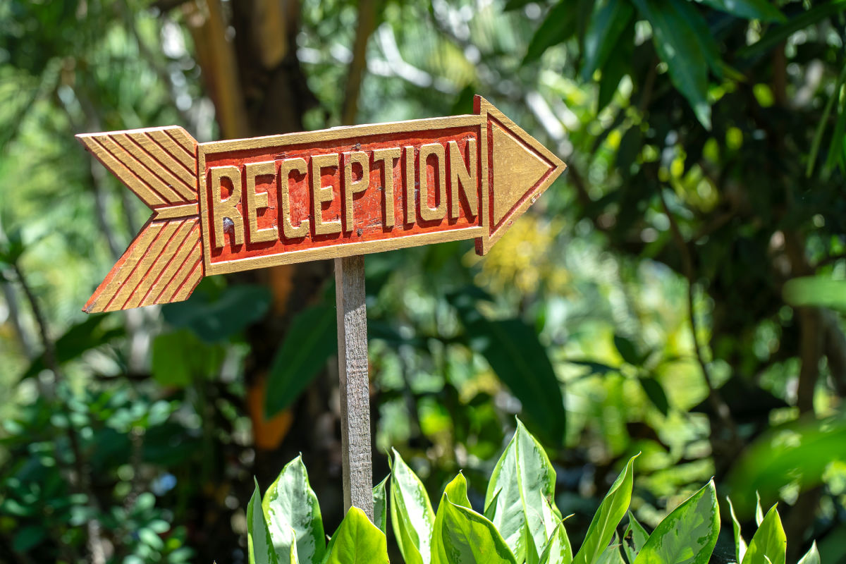 Reception Sign At Bali Hotel Guesthouse.jpg