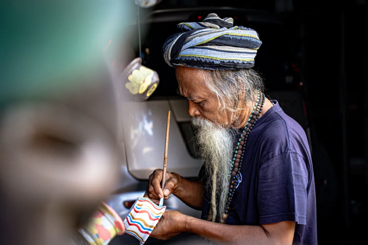 Bali Artist Paints Pot .jpg