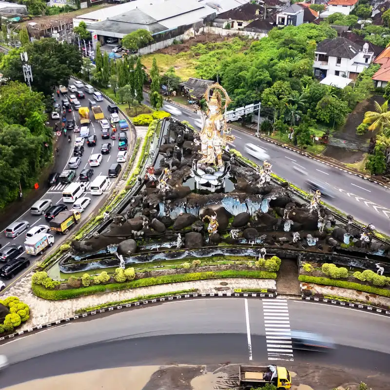 Titi Banda Statue Intersection Traffic Bali