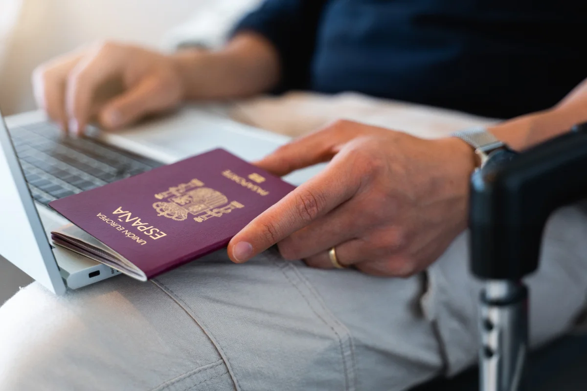 Passport And Laptop Close Up.jpg