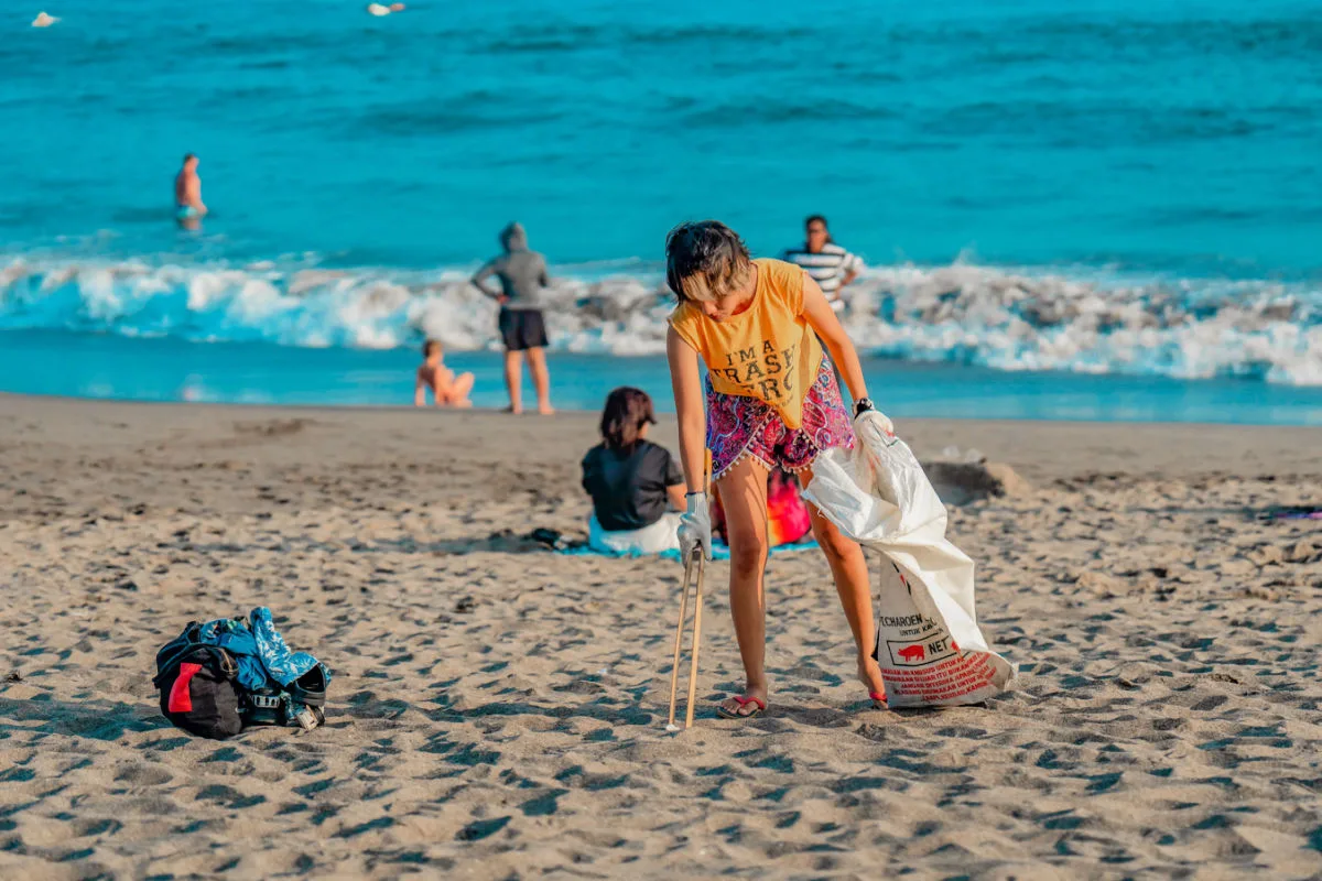 Volunteer Tourist Pick Litter Form Bali Beach.jpg